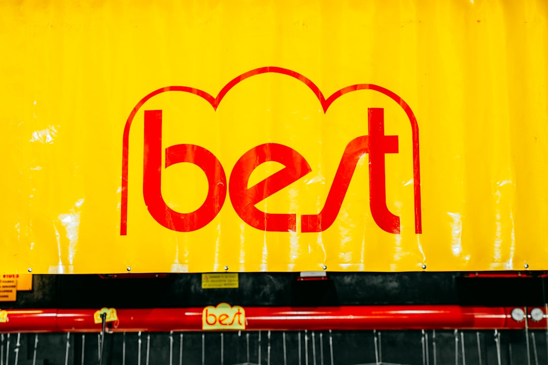 Yellow background with a red 'best' logo